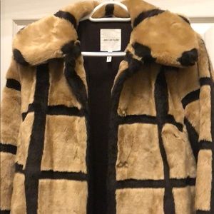Modern faux fur panel coat